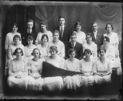 Class of 1920
1st Row: Dorothy G. Flagg (Stoddard), Doris T. Hornung (Greenfield), unkn, unkn, Margaret E. Elmer (Keffer), Ethel Eileen Hale (Meehan)

2nd Row: unkn, unkn, Agnes M. McLaughlin, Marion Van deWalker (Esmay), Lawrence B. Wilkinson, Florence E. Young, Viola E. Fox (Meehan)

3rd R.: unkn, Carleton F. Dillon, Claribel L. Van Voorhees, Smith Johnson, Reba Anne Watkins (Rudolph), Ludwig H. Krissler, Magdalene Hornung (Poland)

Unidentified: Pearl Mary Burns (Kotary), Margaret A. Marks, Helen A. Phalen (Hover), Alice Anne Quinn (Freeman), Amanda Wilson (Palmer)

Absent: William L. Edic
