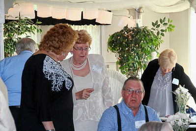 2012 Banquet
L to R: Nancy Watson Mahle, `72; Clara Willson Loveland,  `55; David Loveland; at rear, Patricia Brazil Belge, `53 
