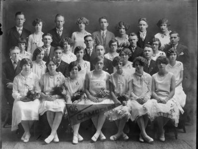 Class of 1926
1st Row: Alice V. Burns, Alma M. Smith (Coady), Margaret C. Fitzgerald, Olive M. Tuttle (Thiessen), Alice M. Manley (Kiddney), Eleanor N. Chase (Cole), Loretta A. Austin (Williams)

2nd Row: Lynn R. Taylor, Mary A. Thomas, Bernard C. Sullivan, Irene M. Lafferty (Sauer), Thomas J Williams, Jr., Freda Crenan, Stedman D. Tuttle, Estella A. Dupont (Suits)

3rd Row: Katie R. Dunn (Alger), Rogers J. Healy, Olive M. Ham (Sanford), Gordon C. Young, Arlene A. Blake (Murray), Paul O. Hale, R. Ella Quinn (Kessler), William Allison

4th Row: Orvin Craven, Leone Rosa, James H. Hallenbeck, Marian LeRichieux, Orville A. Pierce, Ella Jane LeRicheux (Andrews), Chester D. Harvey, Jr., R. Helena McSperit (Smith)

Absent: Homer Dale
